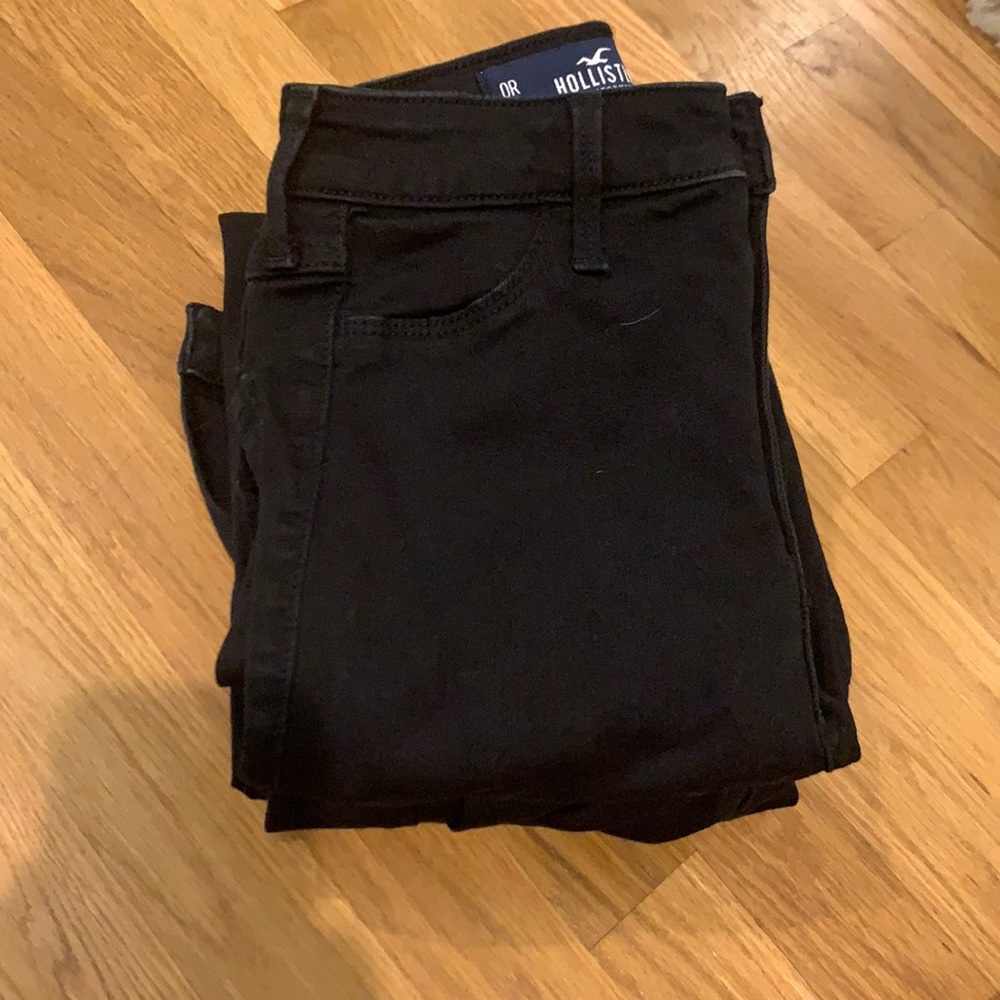 three pairs of black skinny jeans